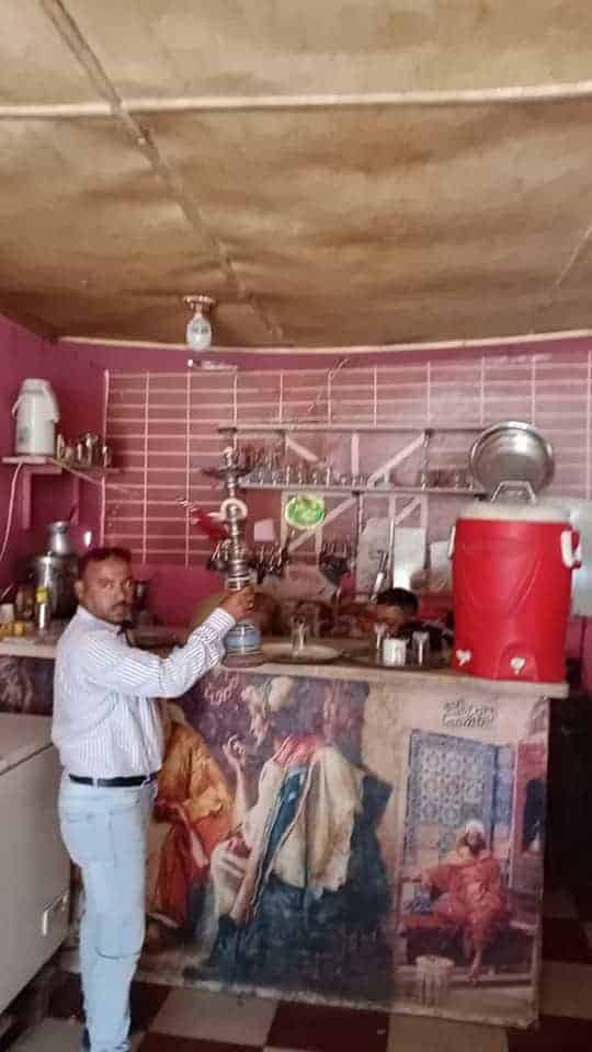 يتحدى القانون .. الحى أغلق له المحل فقام صاحبه بفض الشمع .. تعرف على تفاصيل حملة الاشغالات بالدقى وكرداسة