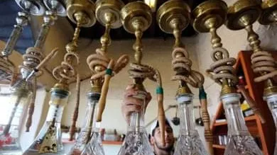 إيقاف قاضيين عن العمل بسبب قضيتى تحريم "المعسل والحلاقة"