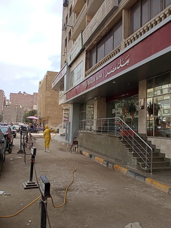 بالصور.. حى العمرانية بالجيزة ينفذ حملات تطير للشوارع للوقاية من كورونا