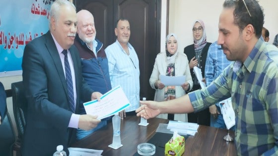 القوى العاملة: تسليم 12 عقد عمل لذوى القدرات للعمل في القطاع الخاص بالدقهلية